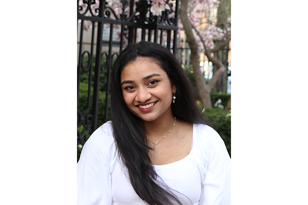Anjana Nandam headshot of her standing outside