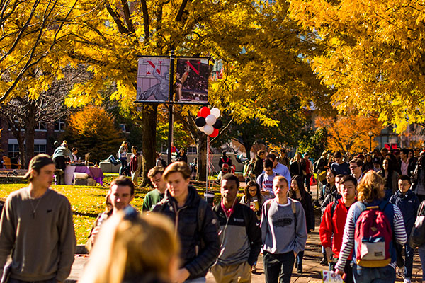 students walking on campus in fall